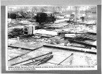 Press photograph of the last prefabs being demolished.